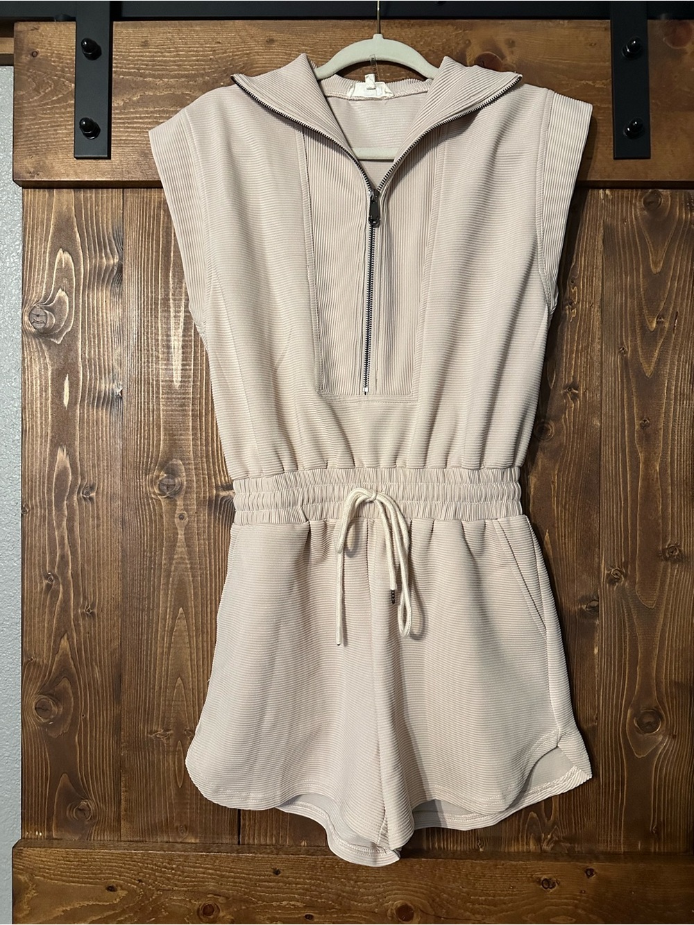 NWOT Sleeveless Zip-Up Romper in Light Beige